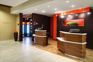 a lobby of a hotel with a reception desk at Courtyard by Marriott London in London