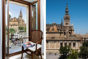 a chair and a window with a view of the city at Magno Apartments Santo Tomas in Seville