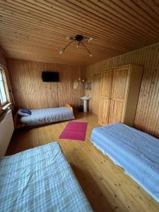 VeskisillaMSJ kodumajutus客房内的一张或多张床位