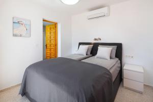 Postel nebo postele na pokoji v ubytování Tetuan 42 Oasis Properties + 37 fotografií