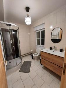 Koupelna v ubytování Koh'm à la maison
