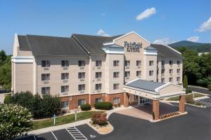an image of a hotel with a building at Fairfield Inn & Suites Roanoke Hollins/I-81 in Roanoke