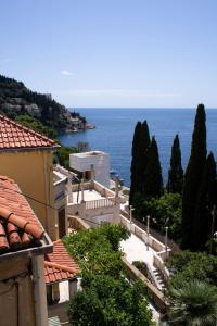 a view of the ocean from a building at Apartment St.Jacob in Dubrovnik