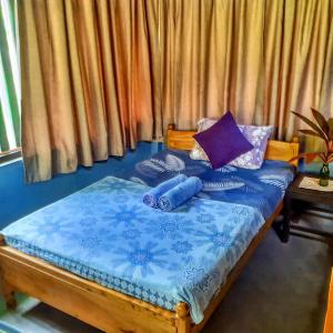 Voodi või voodid majutusasutuse Neem Jay Beach Resort toas