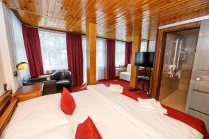 Postel nebo postele na pokoji v ubytování Hotel Jelinek