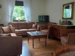 TV a/nebo společenská místnost v ubytování Holiday Home in Hellenthal Forest Retreat