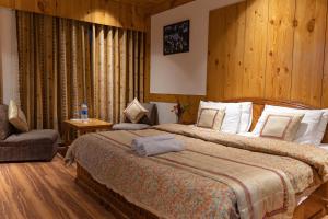 A bed or beds in a room at THE CONIFER