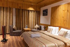 A bed or beds in a room at THE CONIFER