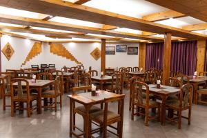 A restaurant or other place to eat at THE CONIFER