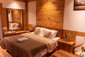 A bed or beds in a room at THE CONIFER