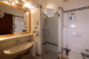 Koupelna v ubytování Hotel Stoiser Graz + 37 fotografií