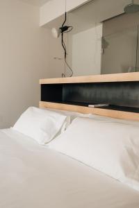 Кровать или кровати в номере Hotel Santa Ana Tudela
