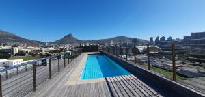 a swimming pool on the roof of a building at Chapel Towers 79 by CTHA in Cape Town