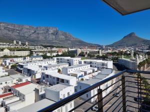 a view of the city from the balcony of a building at Chapel Towers 79 by CTHA in Cape Town