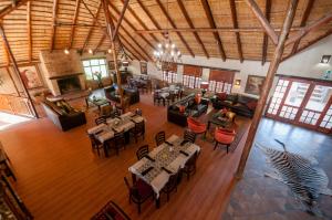 an overhead view of a restaurant with tables and chairs at Zuikerkop Country Game Lodge in Clocolan