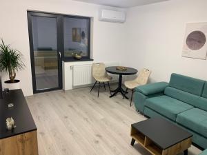 Posezení v ubytování New Apartment Trivale Park