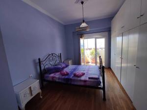 Postel nebo postele na pokoji v ubytování Κορινθιακός
