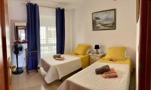 Posteľ alebo postele v izbe v ubytovaní Luxury residence near Puerto Marina