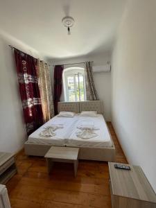 Postel nebo postele na pokoji v ubytování Little himara 1