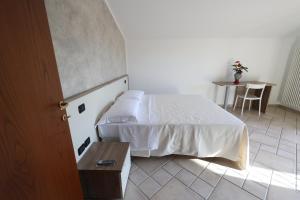 Postel nebo postele na pokoji v ubytování Bed and Breakfast a casa di Valerio