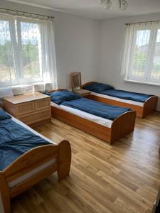 Hostel Łódźka 52 tesisinde bir odada yatak veya yataklar