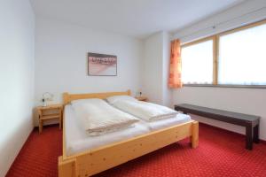 Postel nebo postele na pokoji v ubytování Appartement Strolz