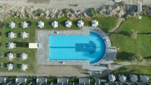 Bazén v ubytování Aquila Rithymna Beach nebo v jeho okolí