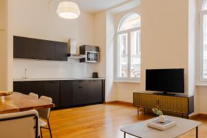 TV a/nebo společenská místnost v ubytování Sonder Fontana Di Trevi