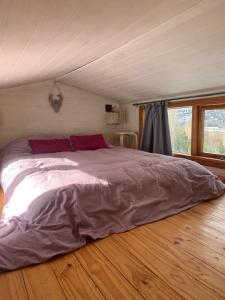 Postel nebo postele na pokoji v ubytování Hermosa Tiny House con Vista al Chapelco + 14 fotografií
