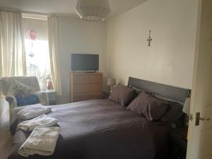 Ένα ή περισσότερα κρεβάτια σε δωμάτιο στο East Linton Flat