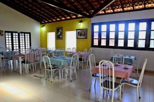 Restaurant ou autre lieu de restauration dans l'établissement Pousada Villa Olympia