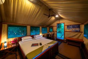 Postel nebo postele na pokoji v ubytování Kulu Safaris - All Inclusive