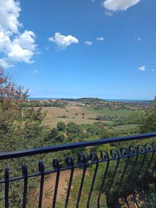 a view of the countryside from a balcony at L'Orizzonte in Castelfidardo