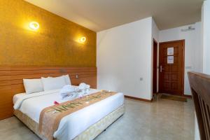 Postel nebo postele na pokoji v ubytování Nala Veli Beach & Spa