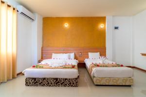 Postel nebo postele na pokoji v ubytování Nala Veli Beach & Spa