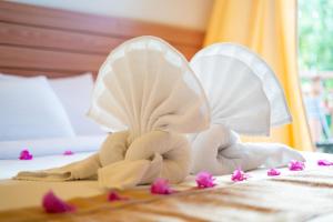 Postel nebo postele na pokoji v ubytování Nala Veli Beach & Spa