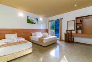 Postel nebo postele na pokoji v ubytování Nala Veli Beach & Spa + 37 fotografií
