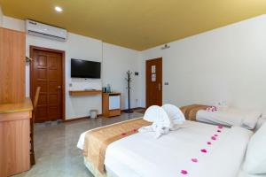 Postel nebo postele na pokoji v ubytování Nala Veli Beach & Spa
