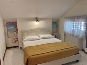 Cama ou camas em um quarto em Bed & Breakfast Casa Anna Rita