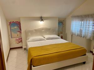 Кровать или кровати в номере Bed & Breakfast Casa Anna Rita +37 фотографий