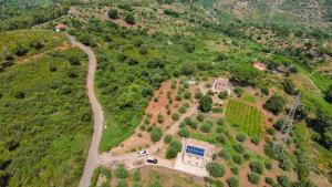 an aerial view of a house on a hill at Agriturismo Case Rapputi in Lascari