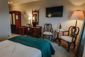 Voodi või voodid majutusasutuse Abbey Hotel Roscommon toas
