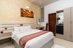 Ένα ή περισσότερα κρεβάτια σε δωμάτιο στο Nala Veli Villa