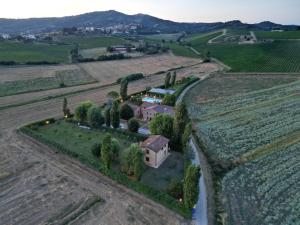 an aerial view of a estate in a vineyard at Casa Vacanze Vecchio Granaio in Magione