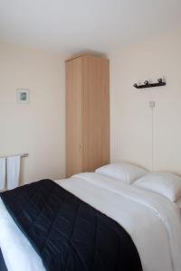 Postel nebo postele na pokoji v ubytování Hotel Du Soleil