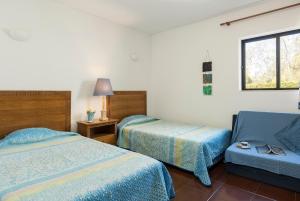 Postel nebo postele na pokoji v ubytování LAURA - Vilamoura