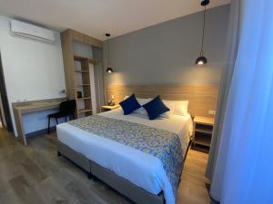 Postelja oz. postelje v sobi nastanitve EcoHub Hotel Medellin
