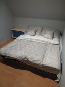 Postel nebo postele na pokoji v ubytování Patak apartman + 11 fotografií