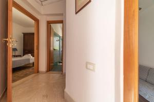 Letto o letti in una camera di Borgo Marino Plemmirio