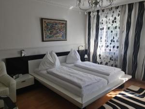 Postel nebo postele na pokoji v ubytování Höckner Plaza Hotel